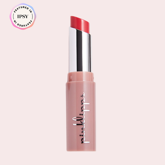 Close-up of Pink Lipps Lumi Balm Lip Tint in shade Dream, showing the smooth creamy pink texture ready for application from Ipsy