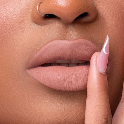 Close up of Pink Lipps Everlasting Matte Liquid Lipstick Nudist on lips for light to medium skin tone