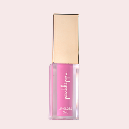 Pink Lipps Pinky Bold Lip Gloss tube on white background – sleek pink gloss with rose-gold cap and bold pigment