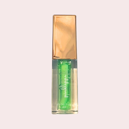 Pink Lipps Taurus Glow Lip Oil tube on white background – clear hydrating gloss with green-apple scent and rose-gold cap