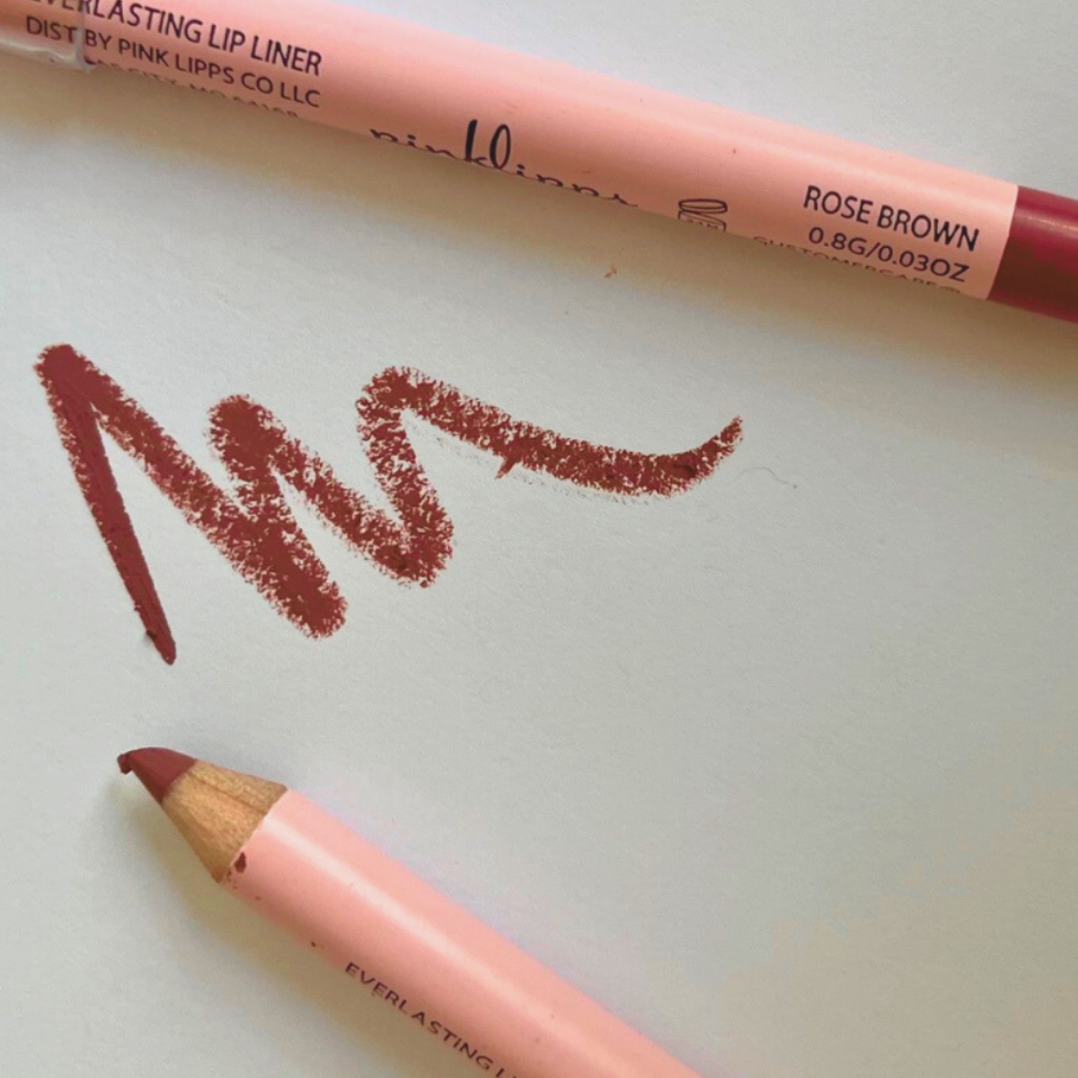 Close-up of Pink Lipps Rose Brown Lip Liner sharpened tip showing creamy precision texture