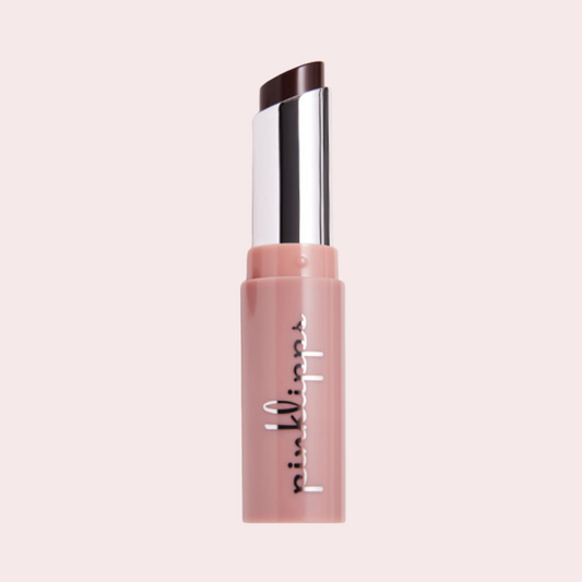 Close-up of Pink Lipps Lumi Balm Lip Tint in shade Beauty Sleep, showing the smooth creamy purple texture ready for application from Ipsy