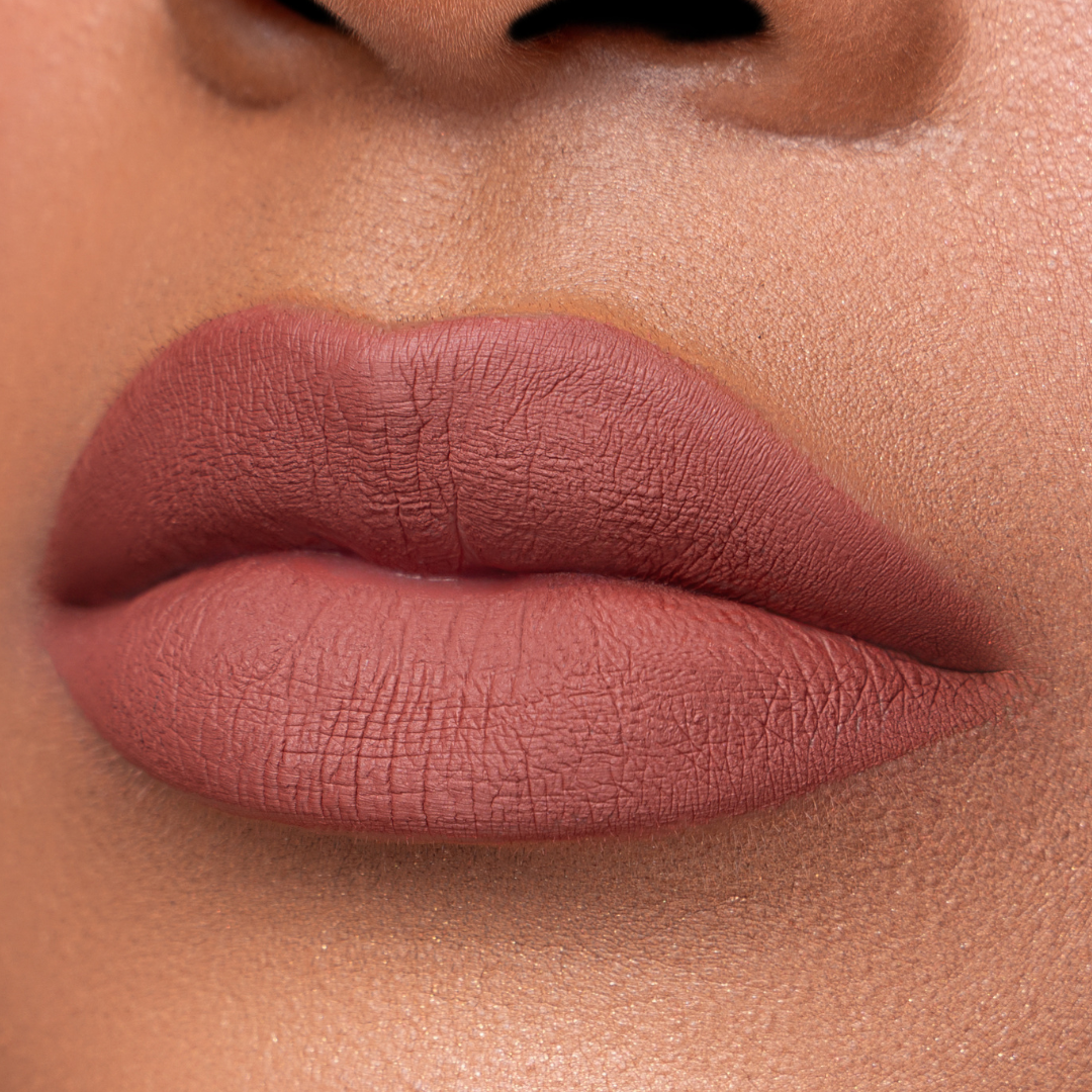 Close up of Pink Lipps Everlasting Matte Liquid Lipstick Bomb AF on lips for light to medium skin tone
