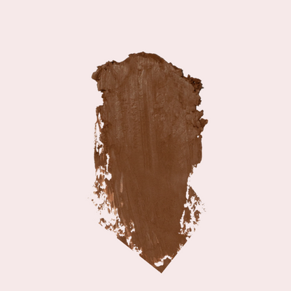 Macro texture shot of 'Cappuccino' Soft Matte Contour Stick formula on skin — soft-matte finish, no harsh lines, buildable contour.