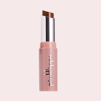 Close-up of Pink Lipps Lumi Balm Lip Tint in shade Fantasy, showing the smooth creamy brown texture ready for application from Ipsy