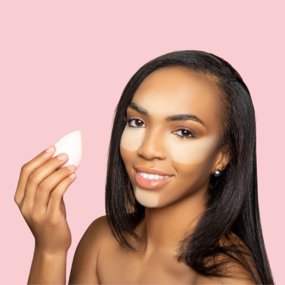 Flawless Sponge Set in use: precision sponge used under eye, forehead, and on chin for highlighting – model on deep skin tone.