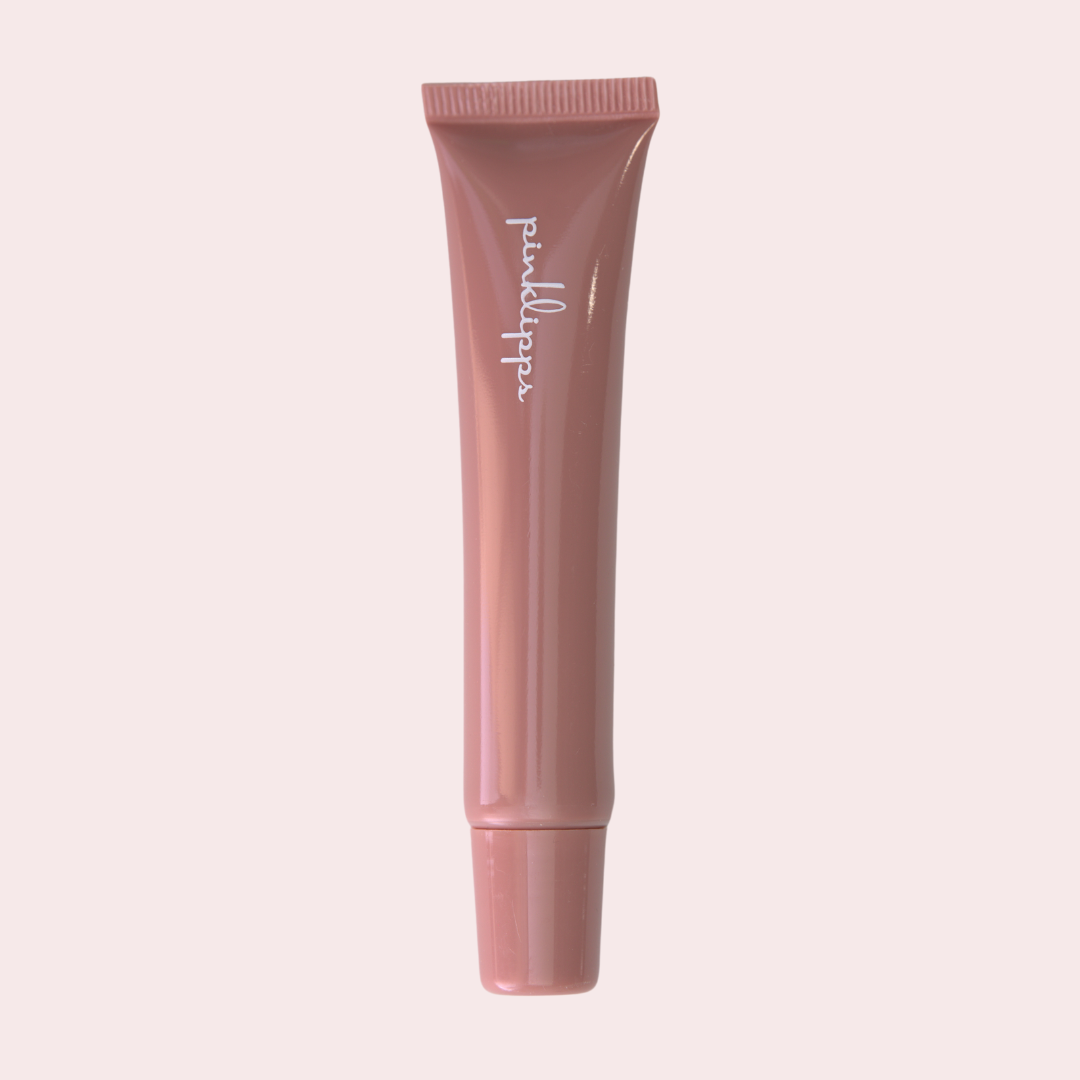 Pink Lipps HER LippEase Tinted Lip Treatments tube on white background – sleek nude lip balm in nude tube