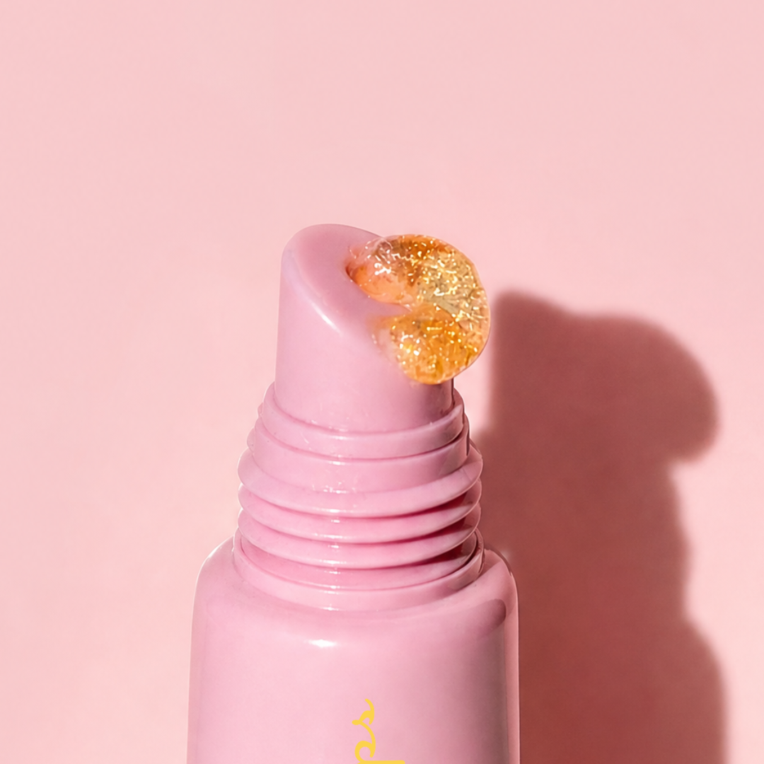 Close-up of Lemon Lip Glaze Sparkly Lip Balm, a hydrating lip balm with shimmering gloss, perfect for glazed lips.