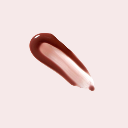 Swatch of LippEase Tinted Lip Treatments ‘Mood’ (brown high-shine balm) showing glassy finish