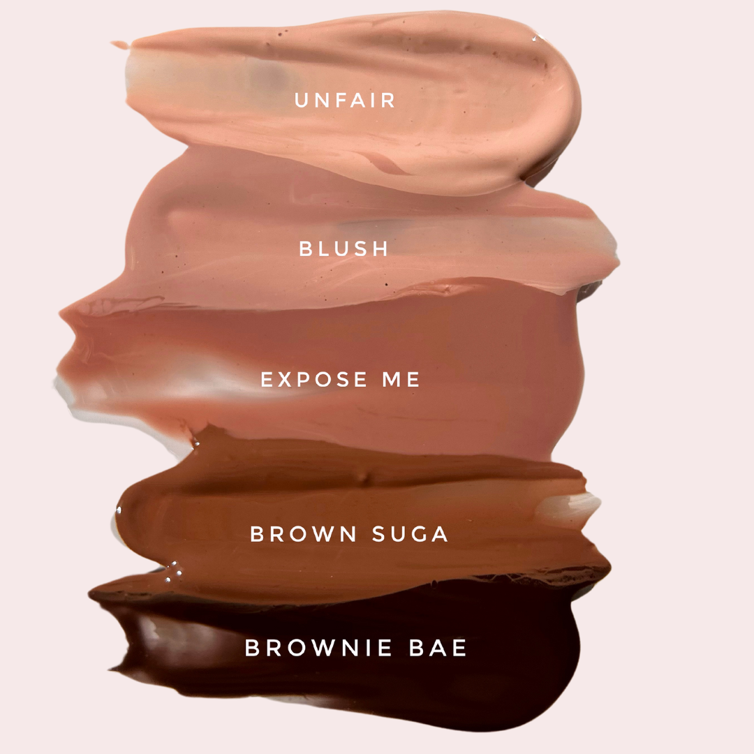 Close-up of Nude Glass Gloss swatches showing creamy, non-sticky gloss texture designed for every skin tone