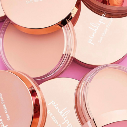 Close-up of Soft Matte Primer and cap in rose-gold finish – smooth gel texture visible