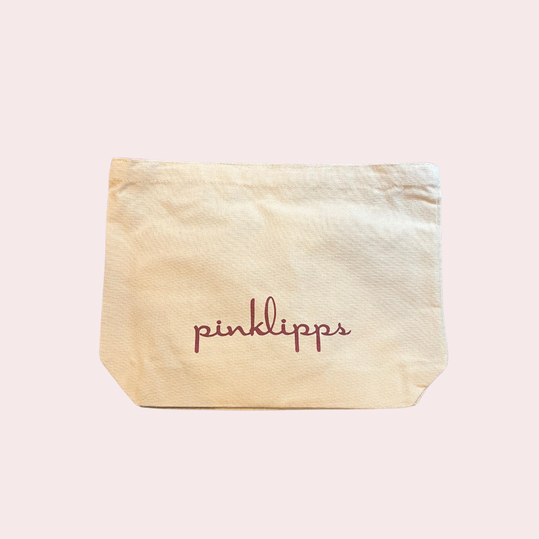 “Pink Lipps Tote Bag tan-neutral canvas with burgundy silk straps – front view on white background”
