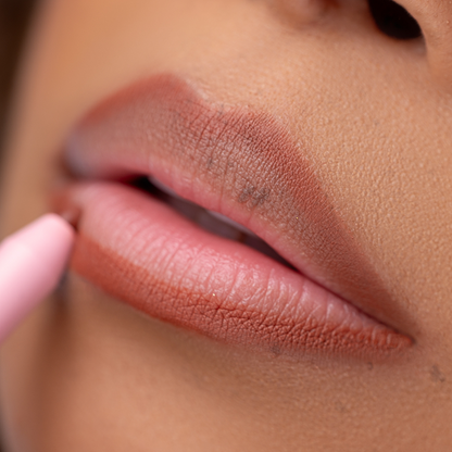 Lip model of Pink Lipps Everlasting 'Warm Brown' Lip Liner showcasing warm brown on light skin tone and lips
